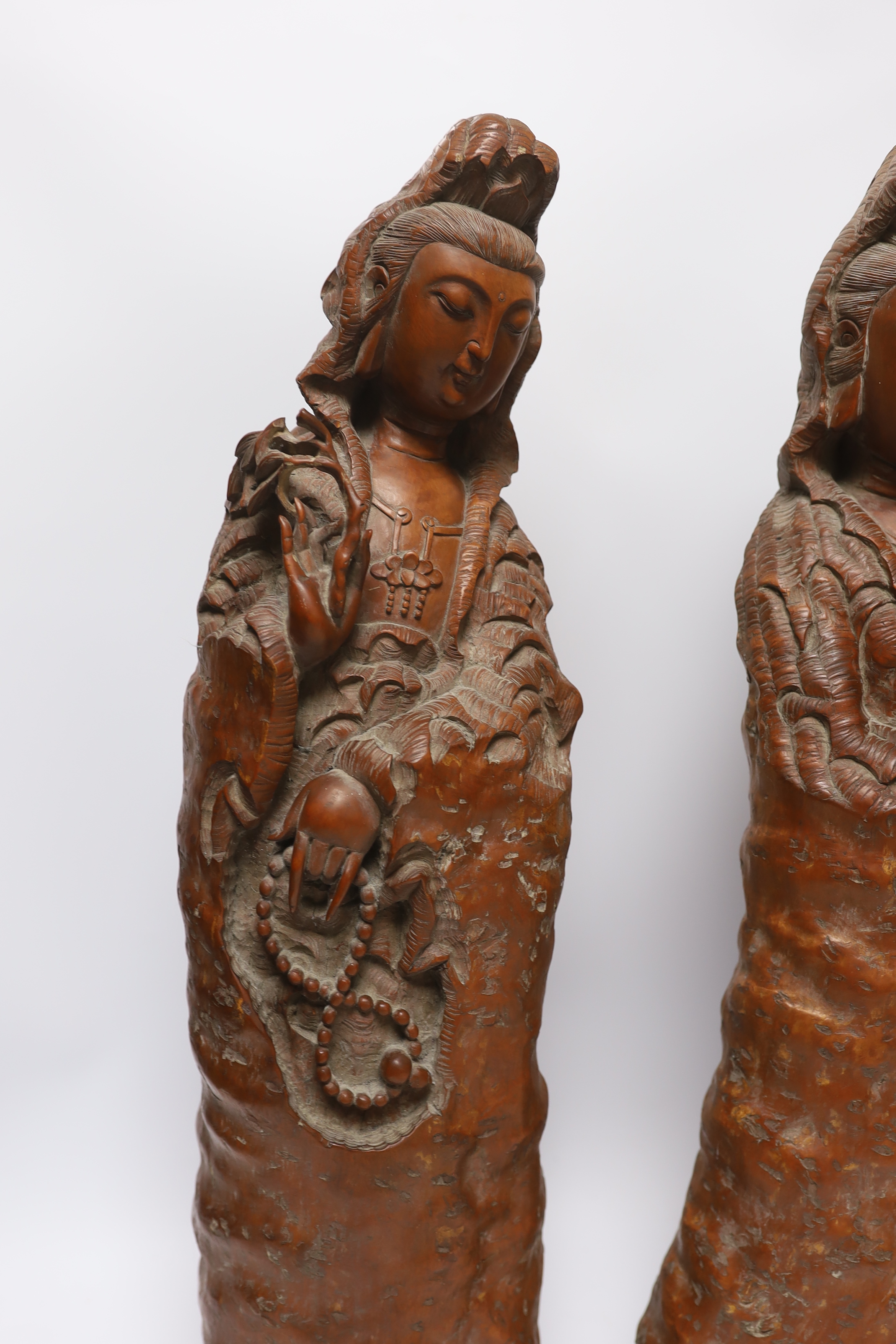 Two large Chinese rootwood figures of Guanyin, 57cm high